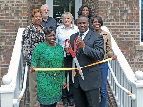 Ribbon cutting Team Clift