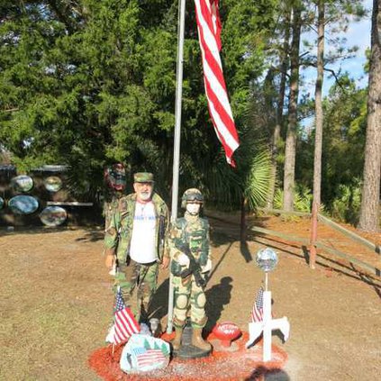 Frank Scozzafava with soldier statue