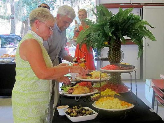 Guests partake in the dinner and desserts provided by Occassions Catering and Event Services