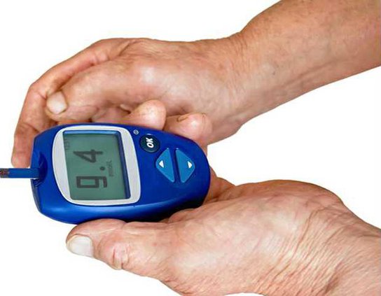 glucometer in the hands of